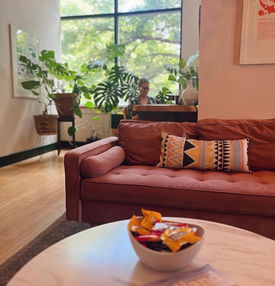 Treat salon shelves — dried florals, tote bags, art